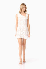 Blonde model wearing Margot Shift Mini Dress in White posed shot