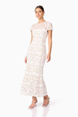 Brunette model wearing Margot Lace Maxi Dress in White posed shot