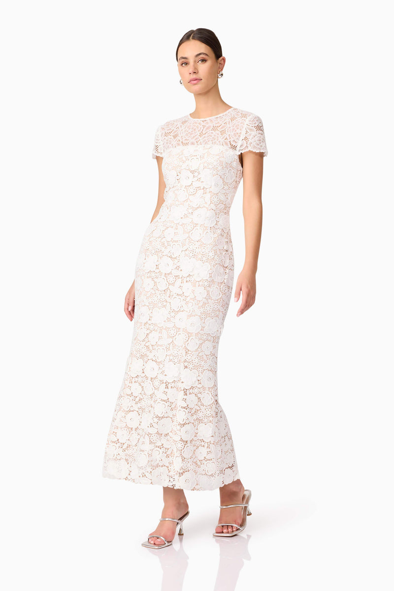 Brunette model wearing Margot Lace Maxi Dress in White posed shot