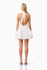 Blonde model wearing Fiona Halter Mini Dress in White back shot