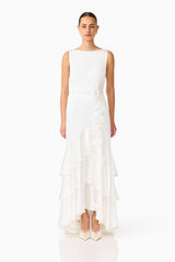 Erielle Tiered Gown in White with tiered skirt and floral belt front shot