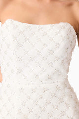 Brunette model wearing Lola Strapless Gown in White detail shot