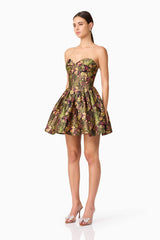 Brunette model wearing Cindy Strapless Mini Dress in Black side shot