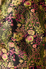 Blonde model wearing Cindy A-Line Mini Dress in Floral detail shot