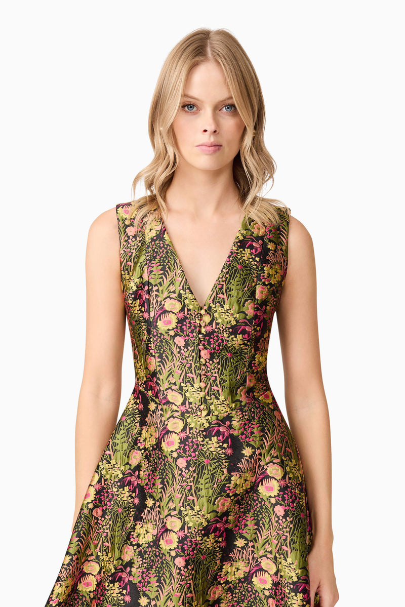 Blonde model wearing Cindy V Neck Gown in Floral close up shot
