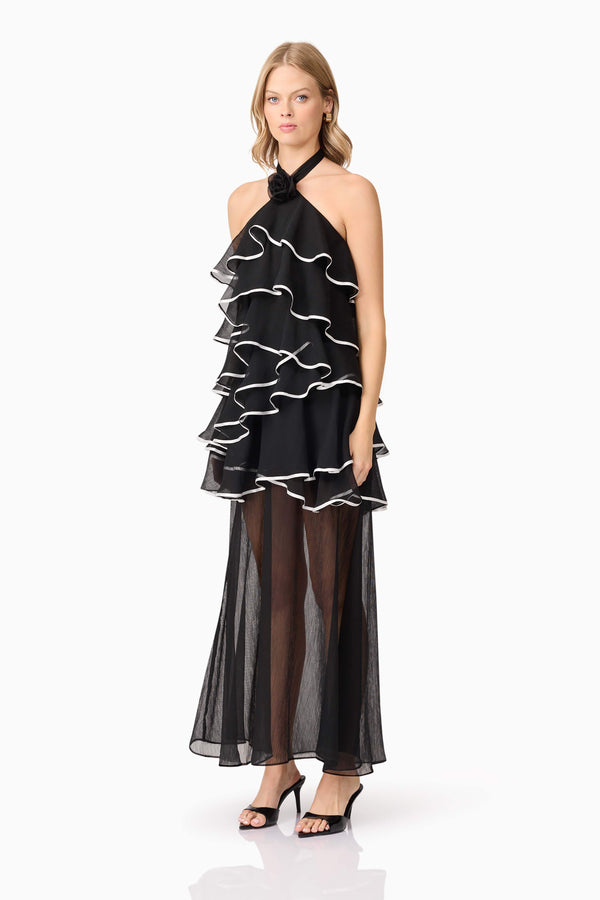 Blonde model wearing Melissa Halter Maxi Dress in Black side shot