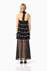 Blonde model wearing Melissa Halter Maxi Dress in Black back shot