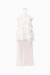 Brunette model wearing Melissa Halter Maxi Dress in White ghost shot