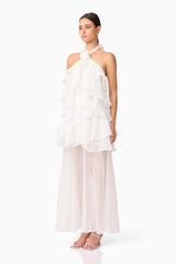 Brunette model wearing Melissa Halter Maxi Dress in White side shot