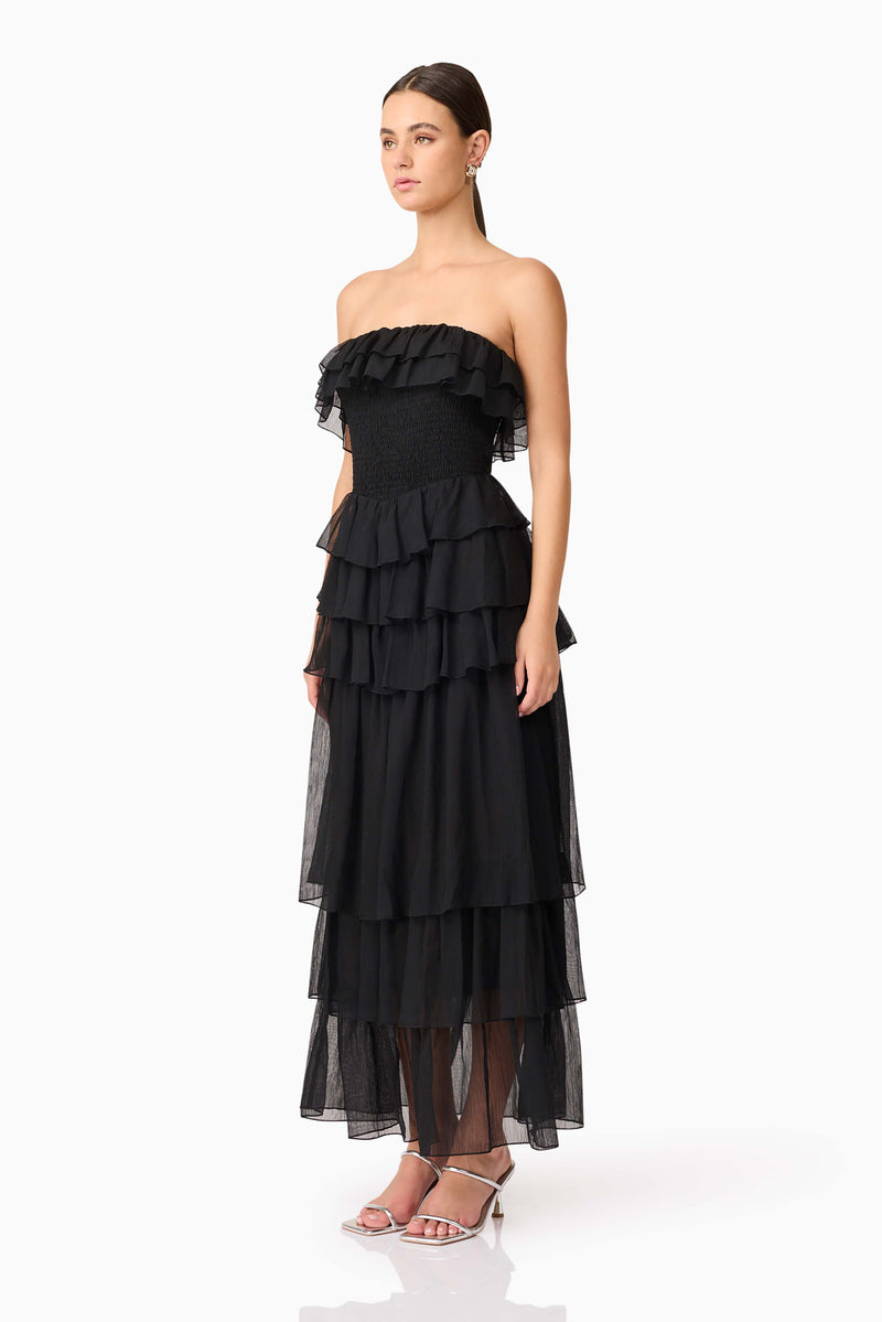 Brunette model wearing Melissa Strapless Maxi Dress in Black side shot
