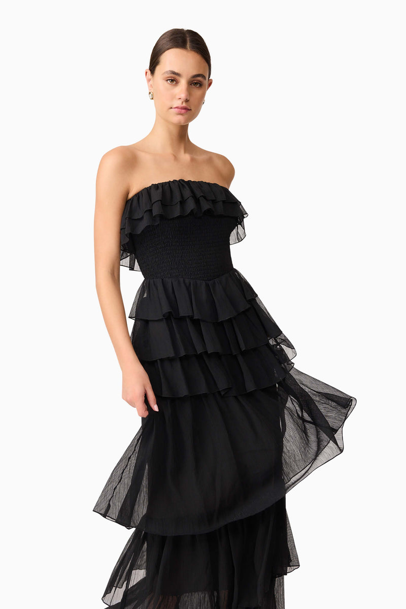 Brunette model wearing Melissa Strapless Maxi Dress in Black close up shot