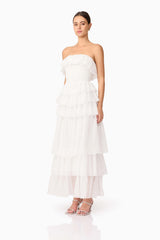 Brunette model wearing Mellisa Strapless Maxi Dress in White side shot