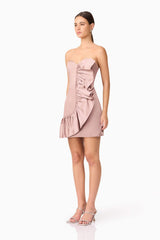 Brunette model wearing Laura Strapless Mini Dress in Pink side shot