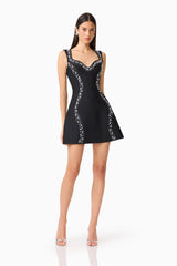 Natasia Embellished Mini Dress in Black with pearl stud detailing posed shot