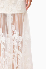 Whynter model wearing the Lorina Strapless Gown in White detail shot