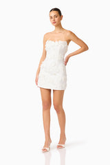 Whynter model wearing the Lorina Strapless Gown in White with skirt detached