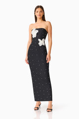 Natasia Embellished Maxi Dress in Black with 3D floral applique and pearl studs posed shot 