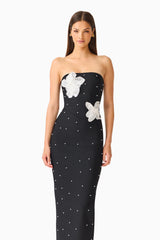 Natasia Embellished Maxi Dress in Black with 3D floral applique and pearl studs close-up shot