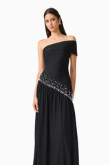 Natasia Off Shoulder Gown in Black with pearl stud detailing hand behind hip shot