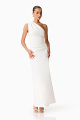 Brunette model wearing the Skye One Shoulder Gown in White posed shot