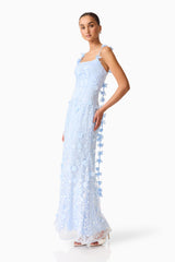 Brunette model wearing the Rina Embellished Gown in Blue posed shot