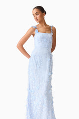 Brunette model wearing the Rina Embellished Gown in Blue front posed shot