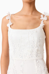 Brunette model wearing the Rina Gown in White front top close up shot