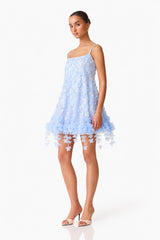 Brunette Model wearing Rina Embellished Shift Mini Dress in Blue side posed shot