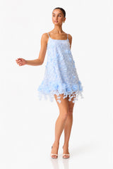 Brunette Model wearing Rina Embellished Shift Mini Dress in Blue posed shot