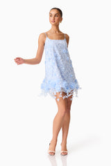 Brunette Model wearing Rina Embellished Shift Mini Dress in Blue posed shot