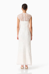 Brunette model wearing the Daelia Embellished Gown White back shot