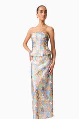 Brunette model wearing the Athea Gown in Floral posed shot