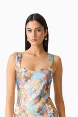 Brunette model wearing the Athea Mini in Floral top close up shot