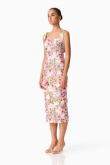 Brunette model wearing Neve Applique Midi Dress in Pink Floral side shot