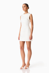 Brunette model wearing Sia Shift Mini Dress side shot