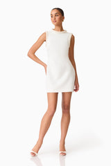 Brunette model wearing Sia Shift Mini Dress posed shot