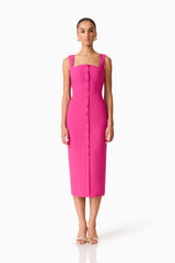 Brunette model wearing the Elva Fitted Midi Dress in Pink front shot