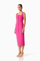 Brunette model wearing the Elva Fitted Midi Dress in Pink side shot