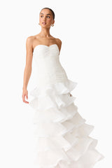 Brunette model wearing the Evelin Tiered Gown in White posed shot