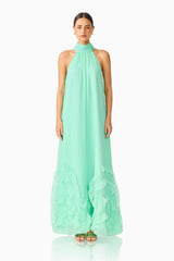 Carla Halter Gown in Mint Green with ruffle hem detailing & relaxed fit front shot