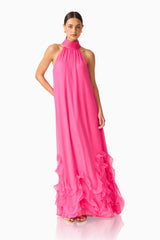 Carla Halter Gown in Pink with ruffle hem detailing & relaxed fit posed shot