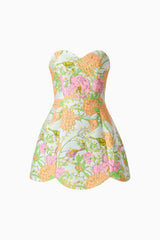 Brunette model wearing the Noralyn Strapless Mini Dress in Green Floral ghost shot