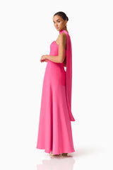 Brunette model wearing the Noralyn Strapless Gown in Pink posed side shot 