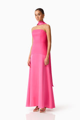Brunette model wearing the Noralyn Strapless Gown in Pink side shot 