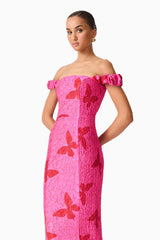 Brunette model wearing the Lorena Jacquard Off Shoulder Midi Dress in Pink close up shot