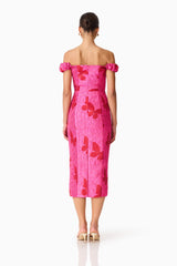 Brunette model wearing the Lorena Jacquard Off Shoulder Midi Dress in Pink back shot