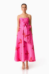 Brunette model wearing The Lorena Jacquard Strapless Gown in Pink front shot