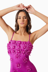 Brunette model wearing Sutton Mini Dress in Purple close up