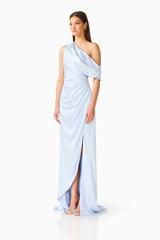 Brunette model wearing the Isadora Off The Shoulder Gown in Pale Blue side shot 