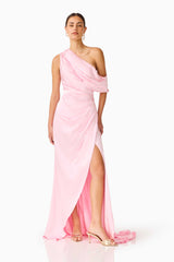 Brunette model wearing the Isadora Off The Shoulder Gown in Pale Pink front posed shot with leg out 